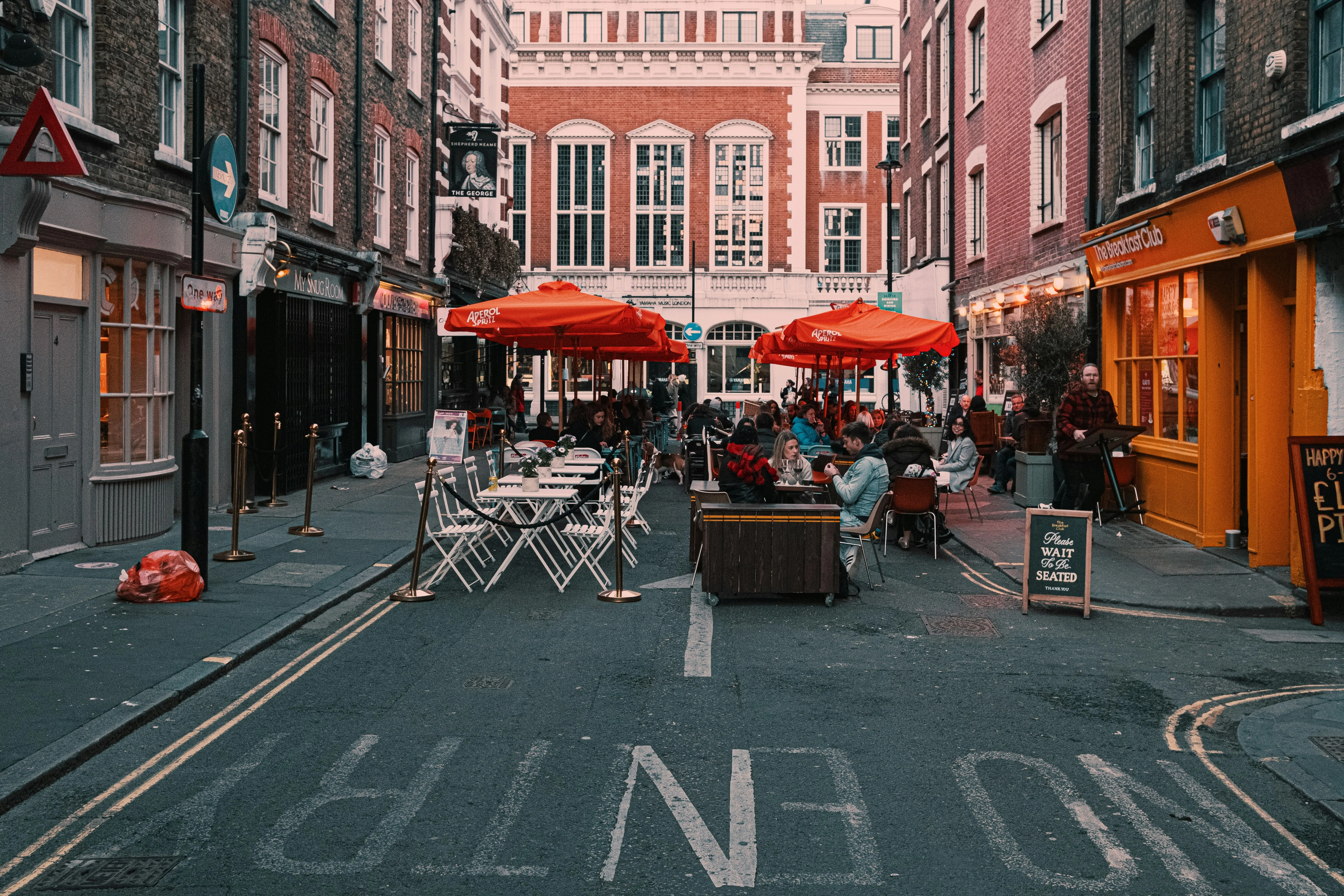 Two people engaged in a meaningful conversation outdoors